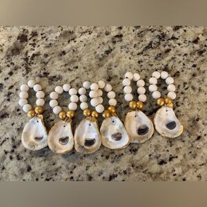 NEW Set of 6  Oyster Shell Napkin Rings
Perfect for coastal tables